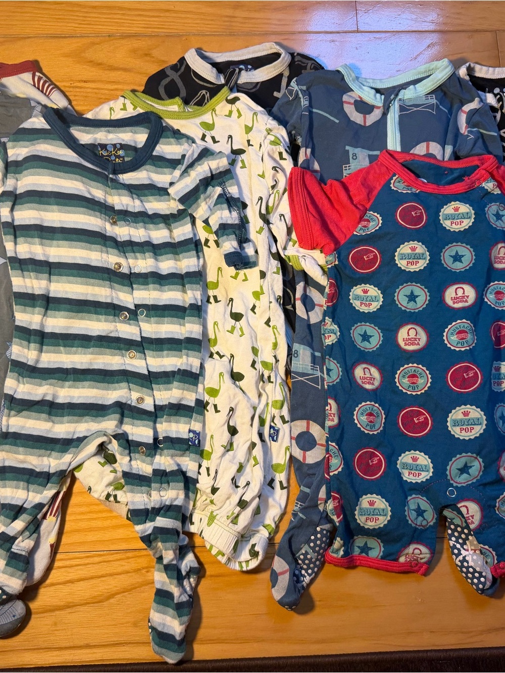 Kickee Pants Mixed Print Footed Sleepers in Blue, Green & Red